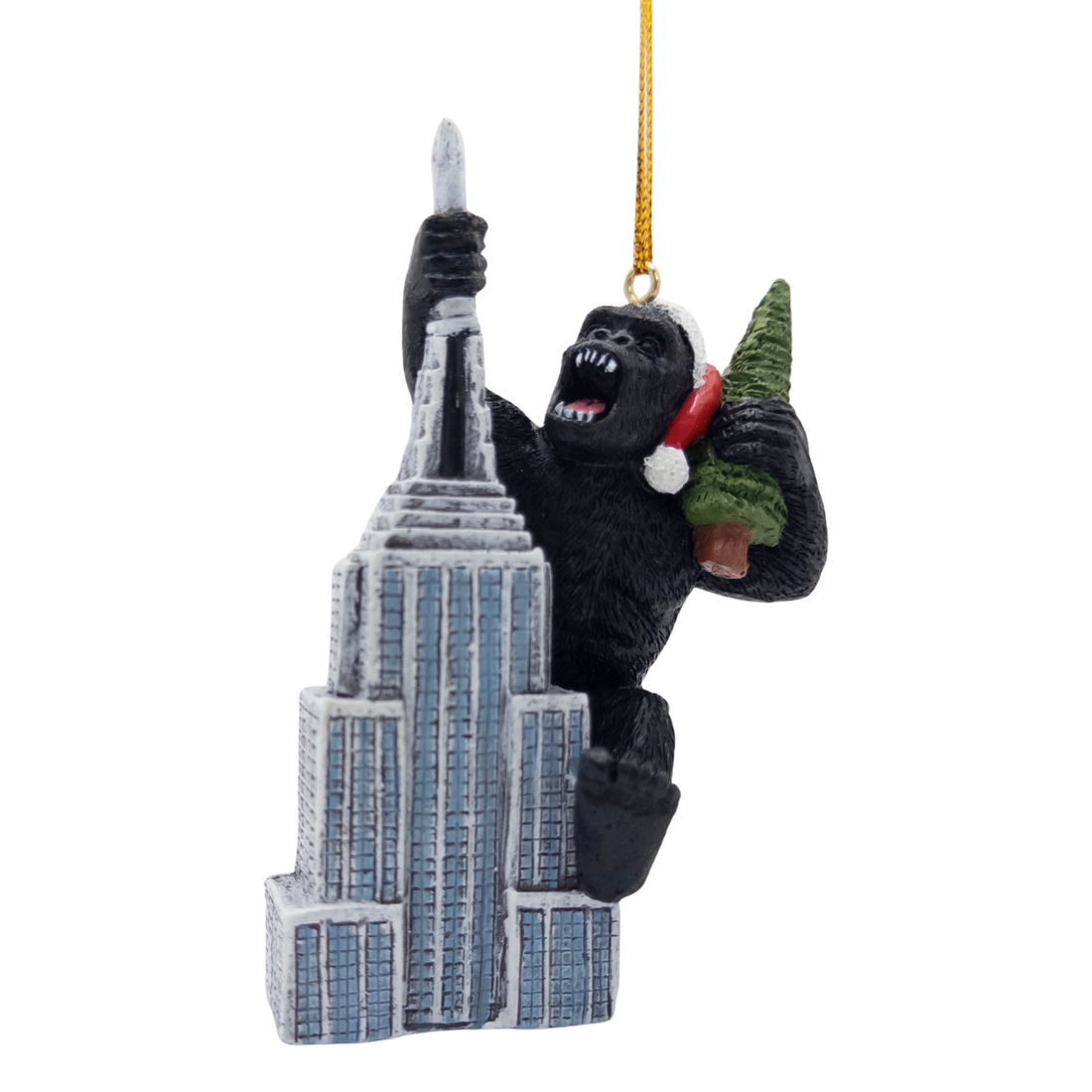 Gorilla Climbing Skyscraper with Christmas Tree