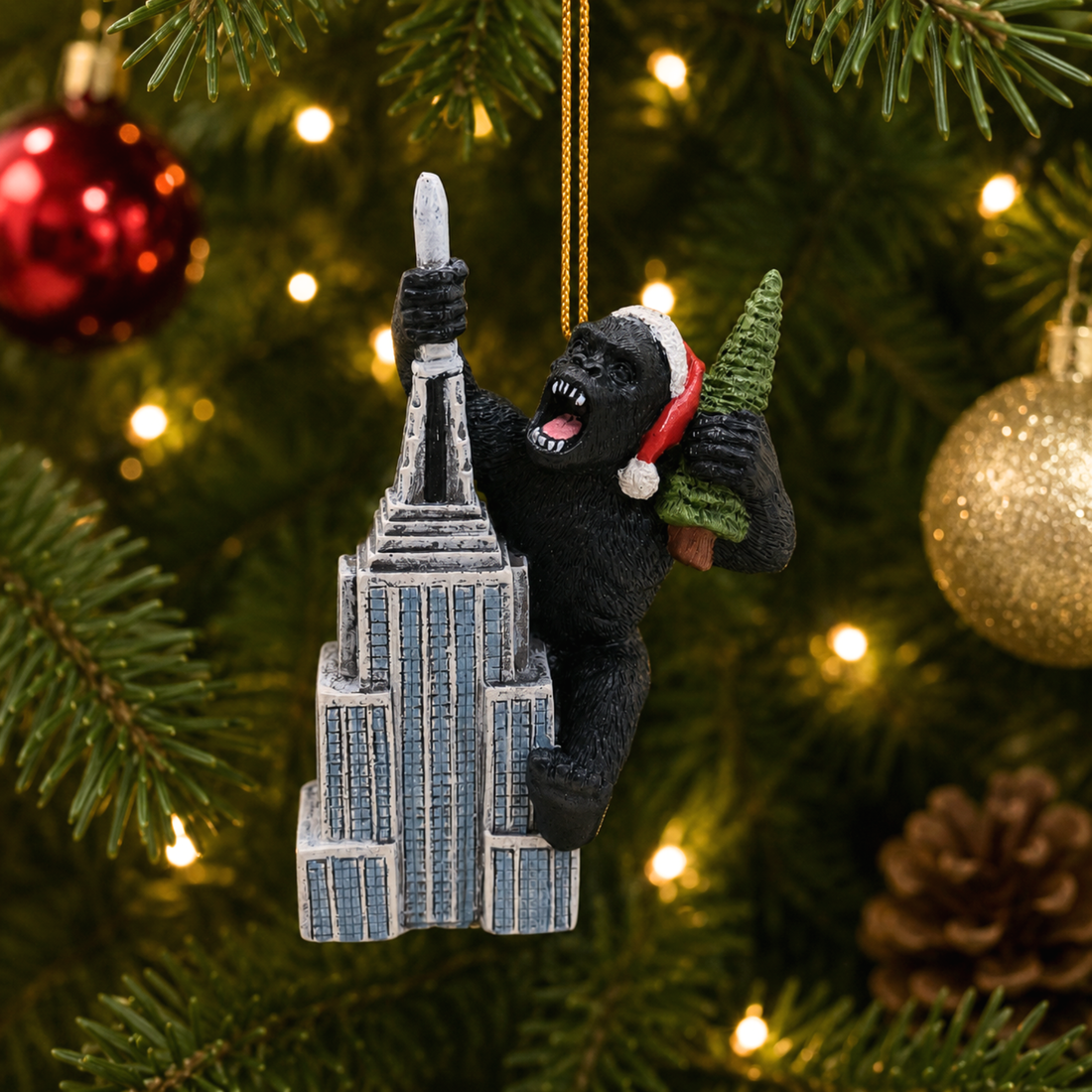 Gorilla Climbing Skyscraper with Christmas Tree