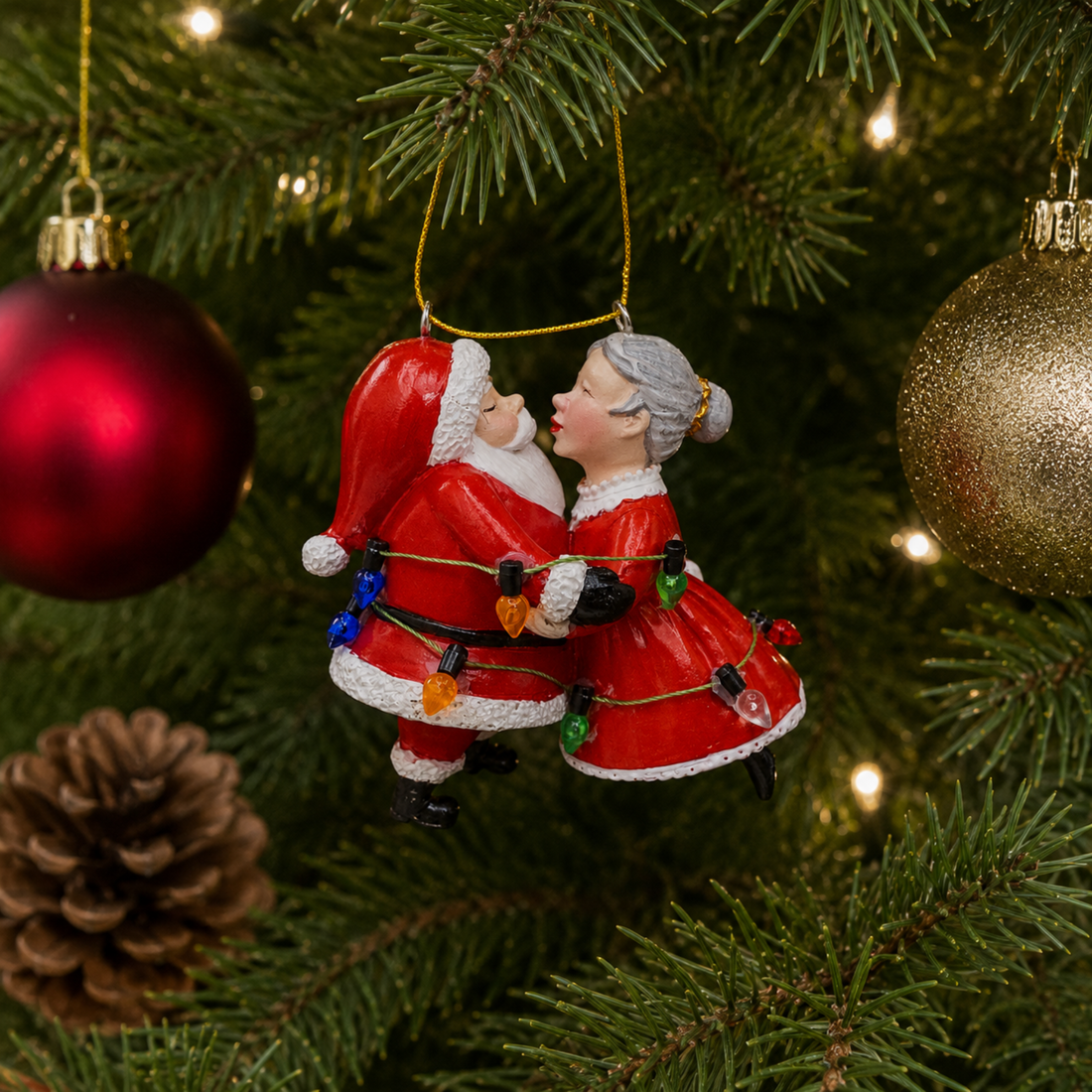 Santa & Mrs. Claus Kissing Wrapped in Lights
